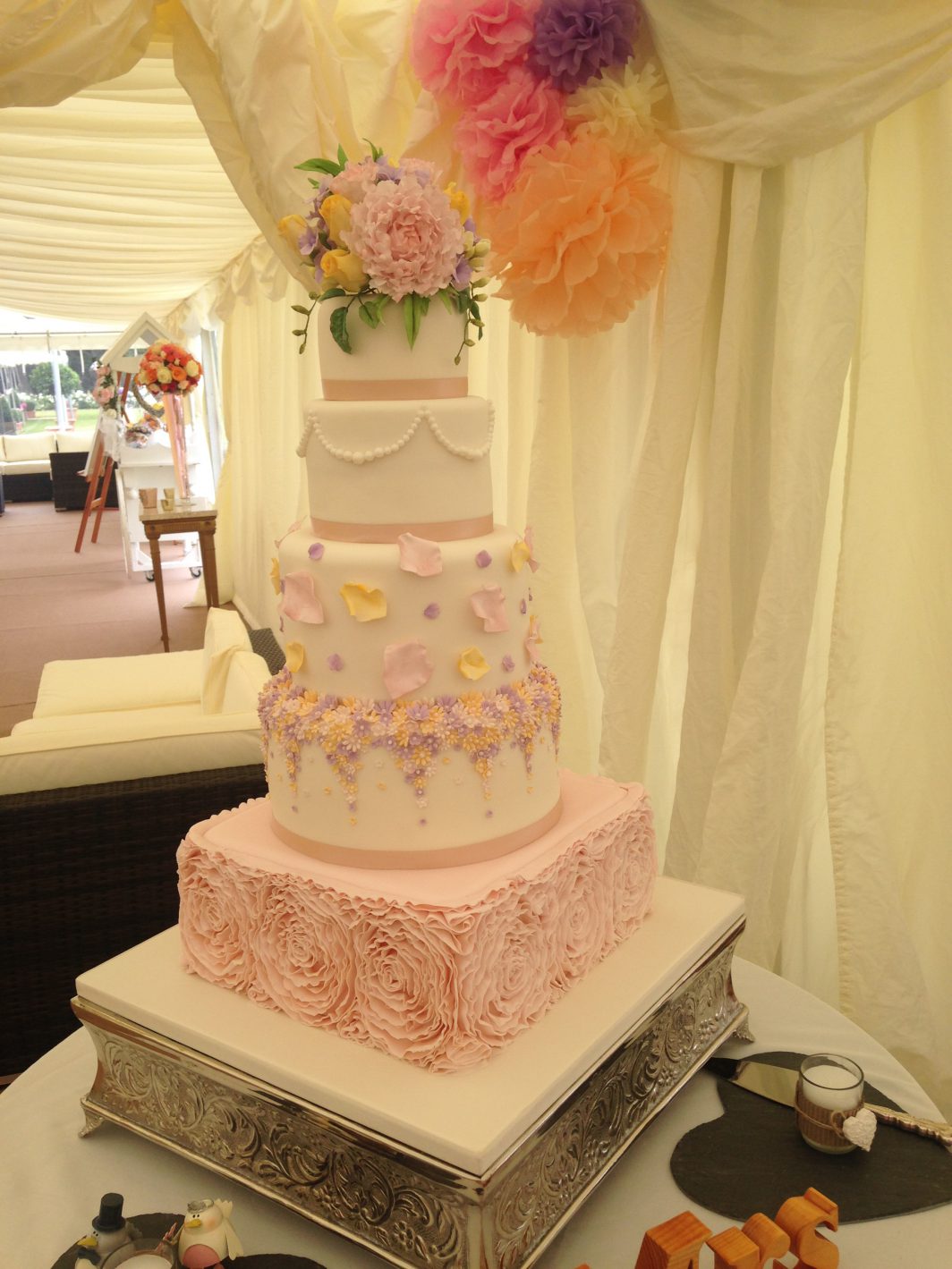 Pastel blossoms wedding cake