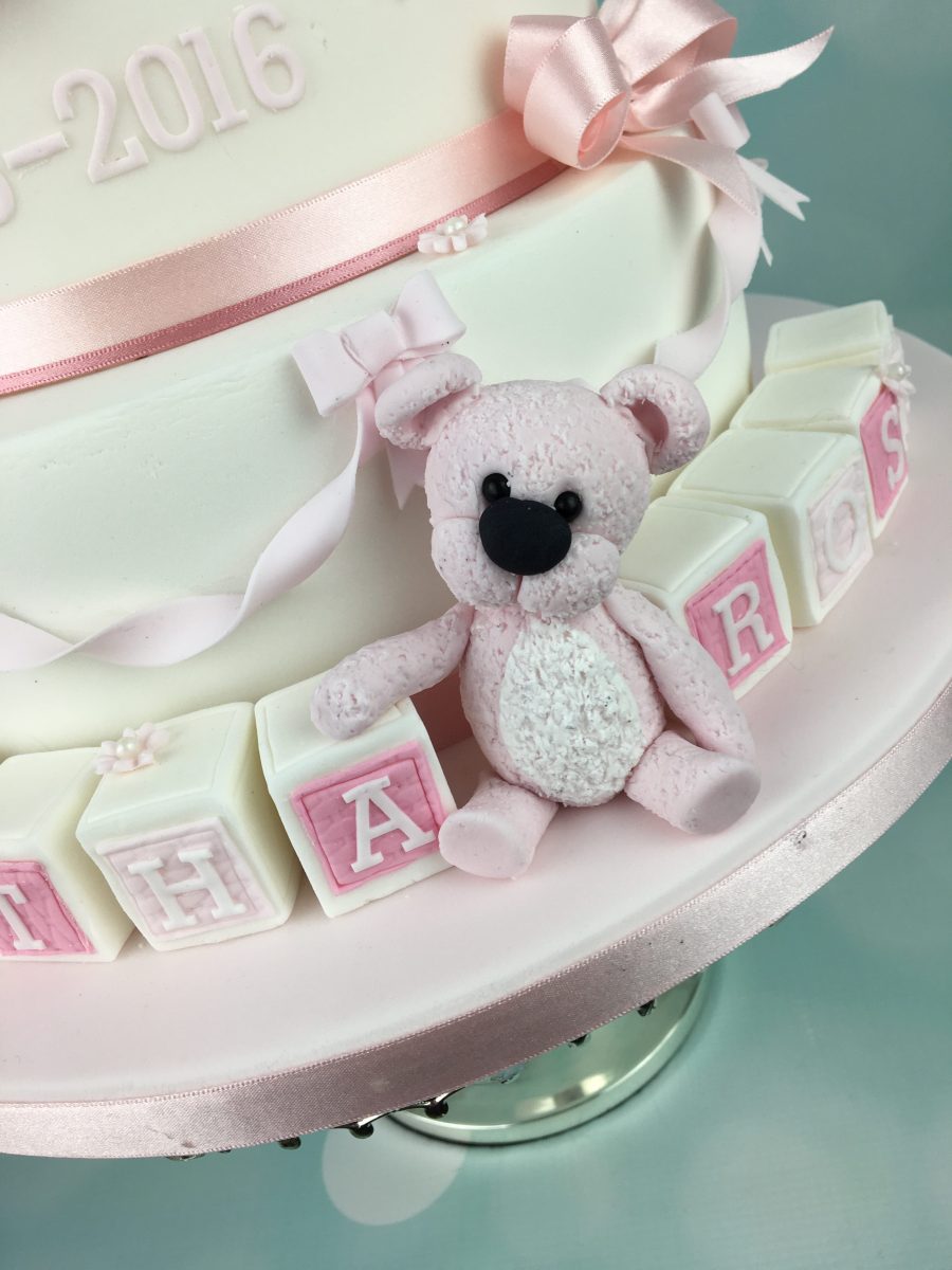Pink Christening cake with cute baby topper - Mel's Amazing Cakes