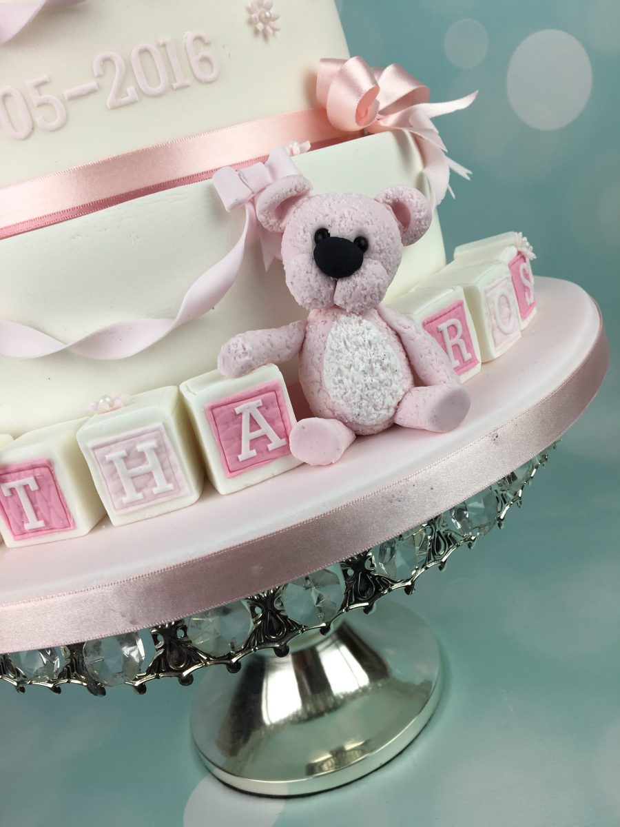 Pink Christening cake with cute baby topper - Mel's Amazing Cakes