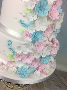 cascading blossoms wedding cake